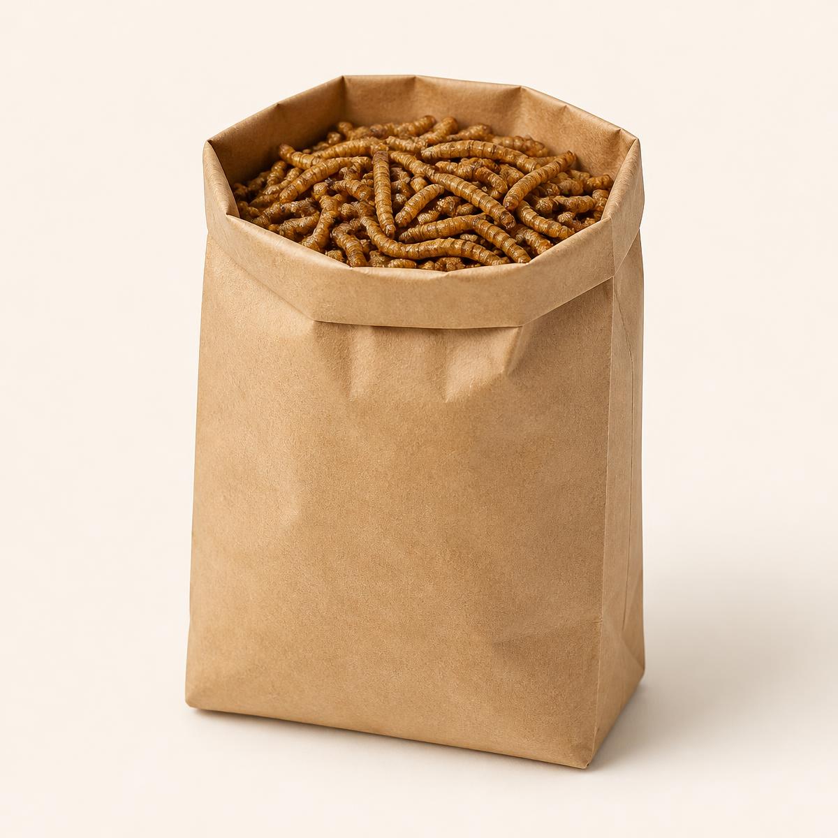 Open kraft sack of dried mealworms on a warm off-white background