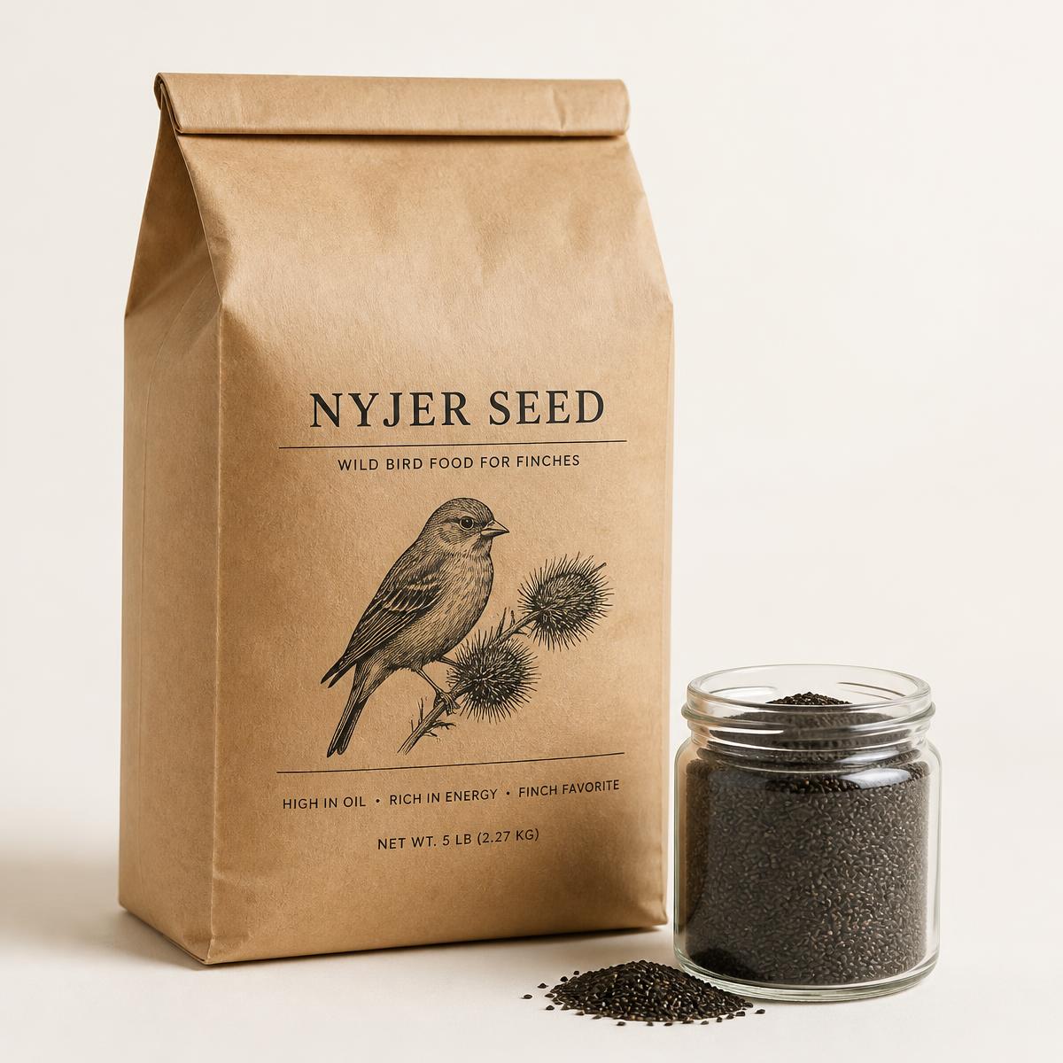 Kraft sack of nyjer seed beside a glass jar of fine black nyjer seed